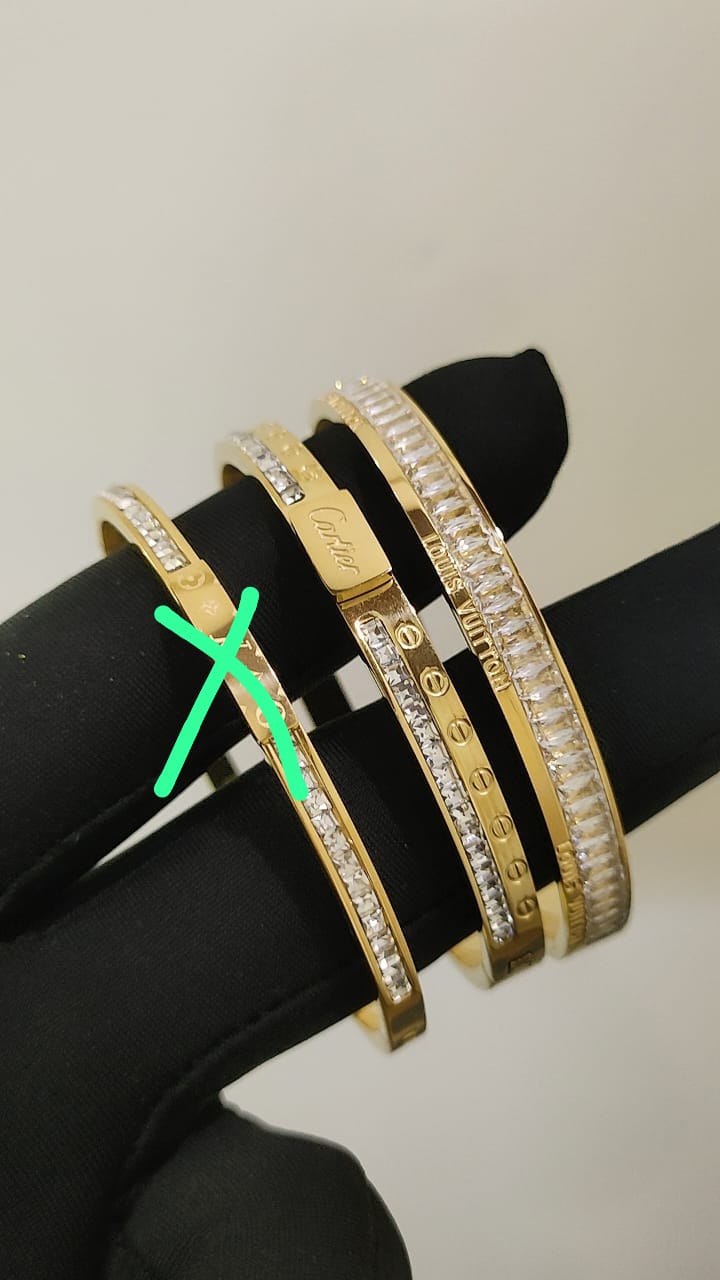 Cartier & Louis Vuitton Braclets Gold