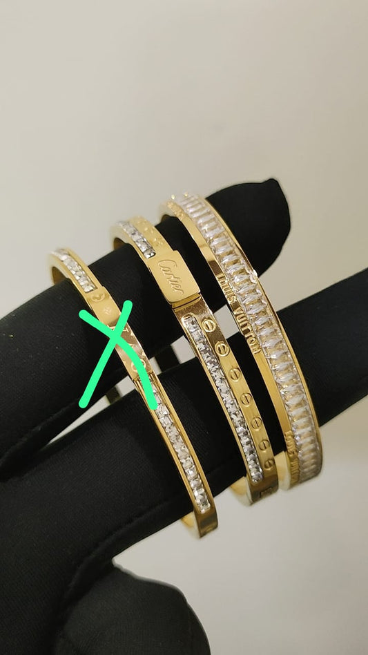 Cartier & Louis Vuitton Braclets Gold